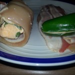 Layers: Chicken, followed by bacon, then a jalapeno filled with cream cheese. 