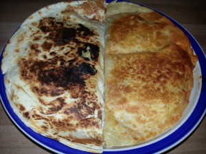 No butter was used on the chicken quesadilla on the left. The quesadilla on the right had 1/2 tbl of butter.
