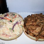 Pulled pork sandwich topped with homemade coleslaw. 