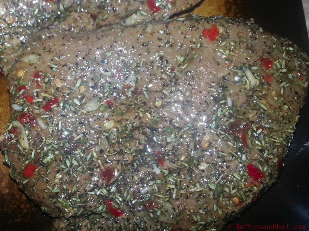 Marinated steaks before going on the grill. 